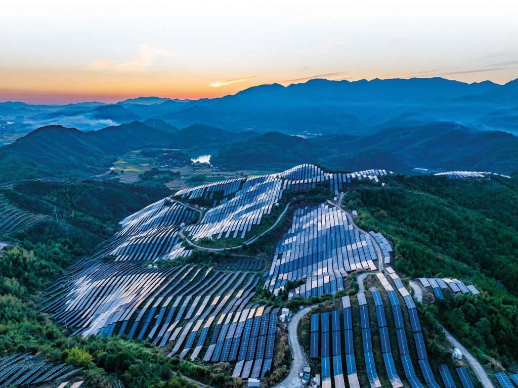 Aerial photography of solar photovoltaic panels on mountain top